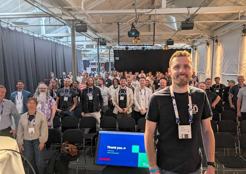 James Hobbs at Codegarden with people attending the Umbraco hosted event