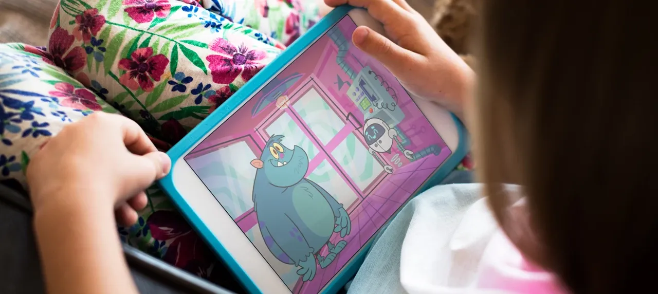 Child on their tablet playing a BBC game