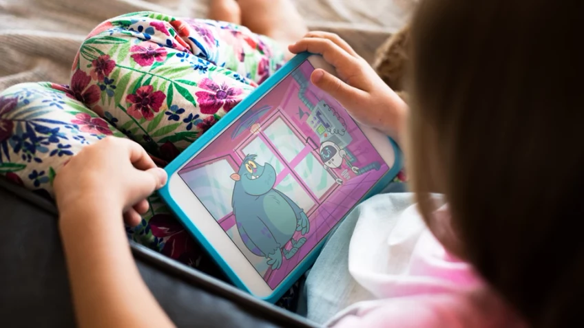 Child on their tablet playing a BBC game