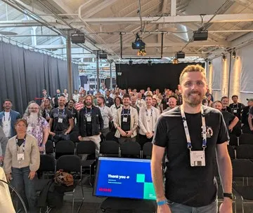 James Hobbs with a group of people at an Umbraco hosted event