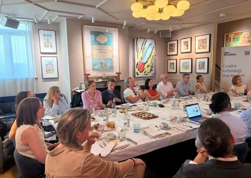 Guests around a table at the lunch and learn event